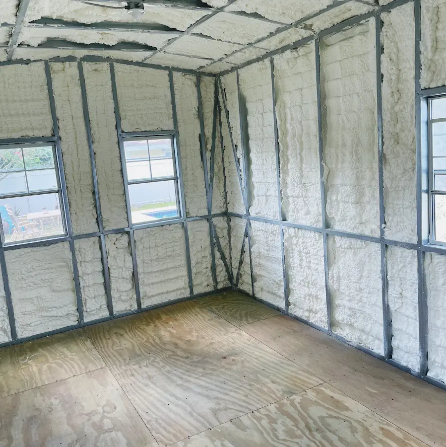 Closed-cell spray foam insulation applied to wall cavities in a residential project in Moab